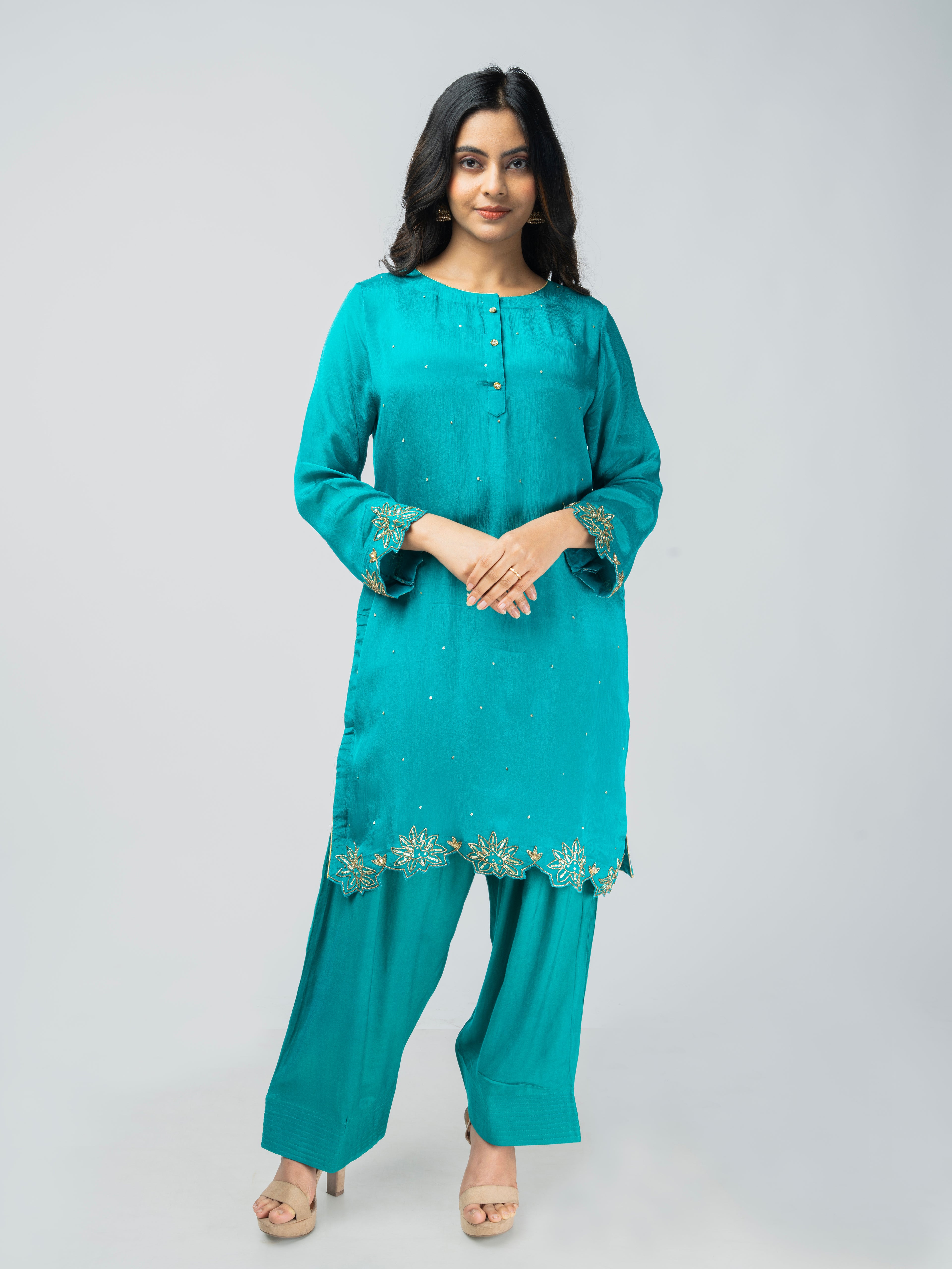 terquoise green co-ordset with stone buttons and farshi salwar