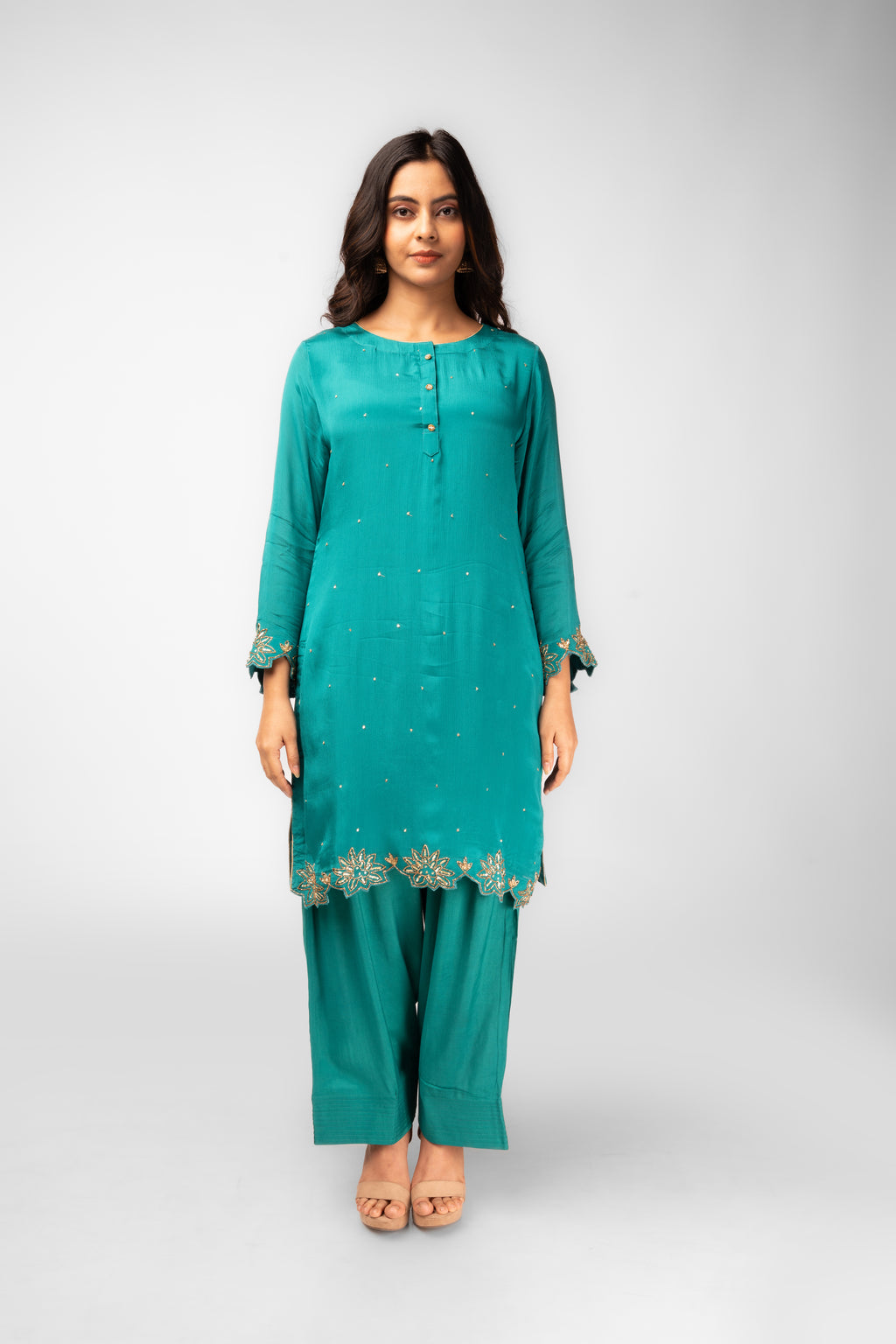 terquoise green co-ordset with stone buttons and farshi salwar