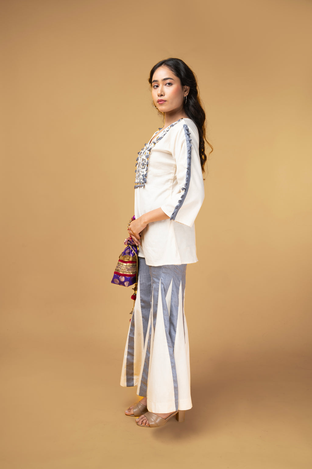 Offwhite and blue denim co-ordset with mirror handwork