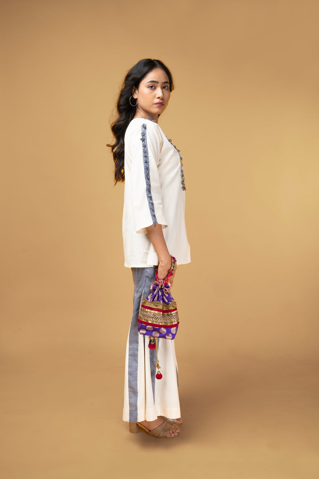 Offwhite and blue denim co-ordset with mirror handwork