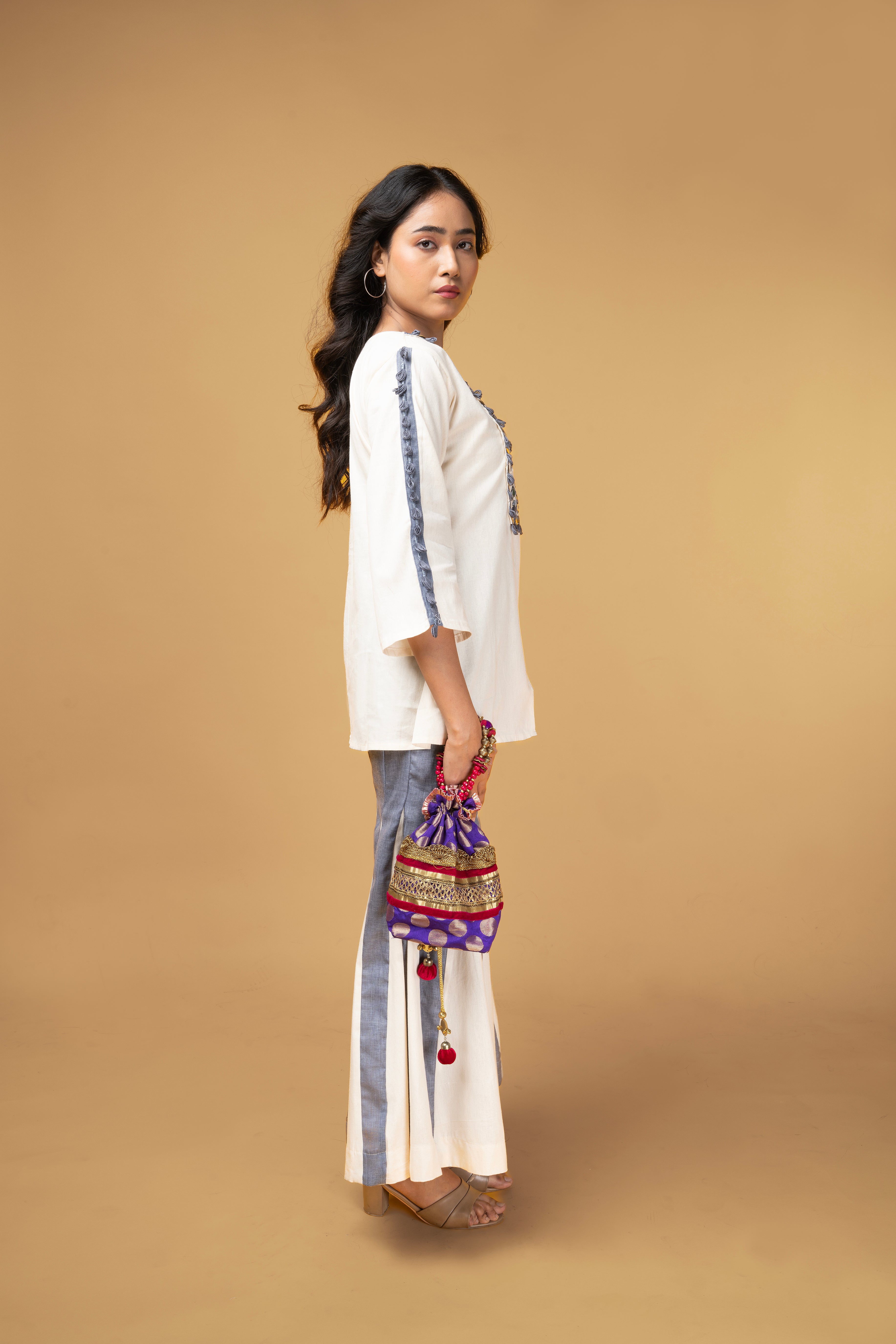 Offwhite and blue denim co-ordset with mirror handwork