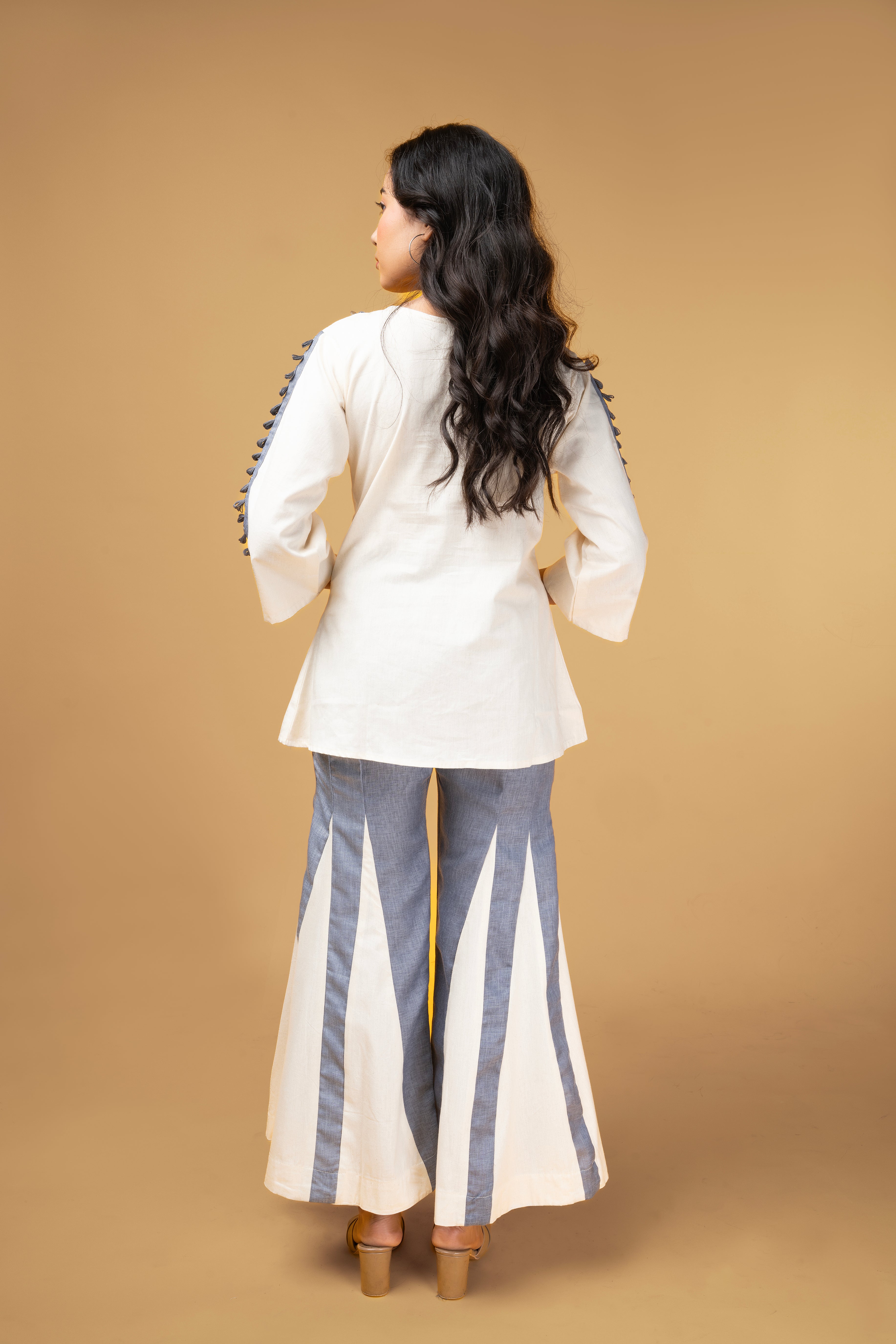 Offwhite and blue denim co-ordset with mirror handwork